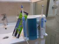 Escova dentes elétrica. Centro dental oral B