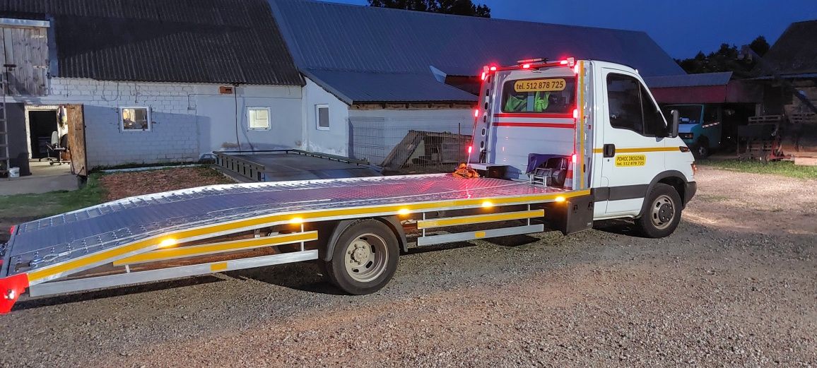 Pomoc drogowa, autolaweta, laweta, transport maszyn i pojazdów
