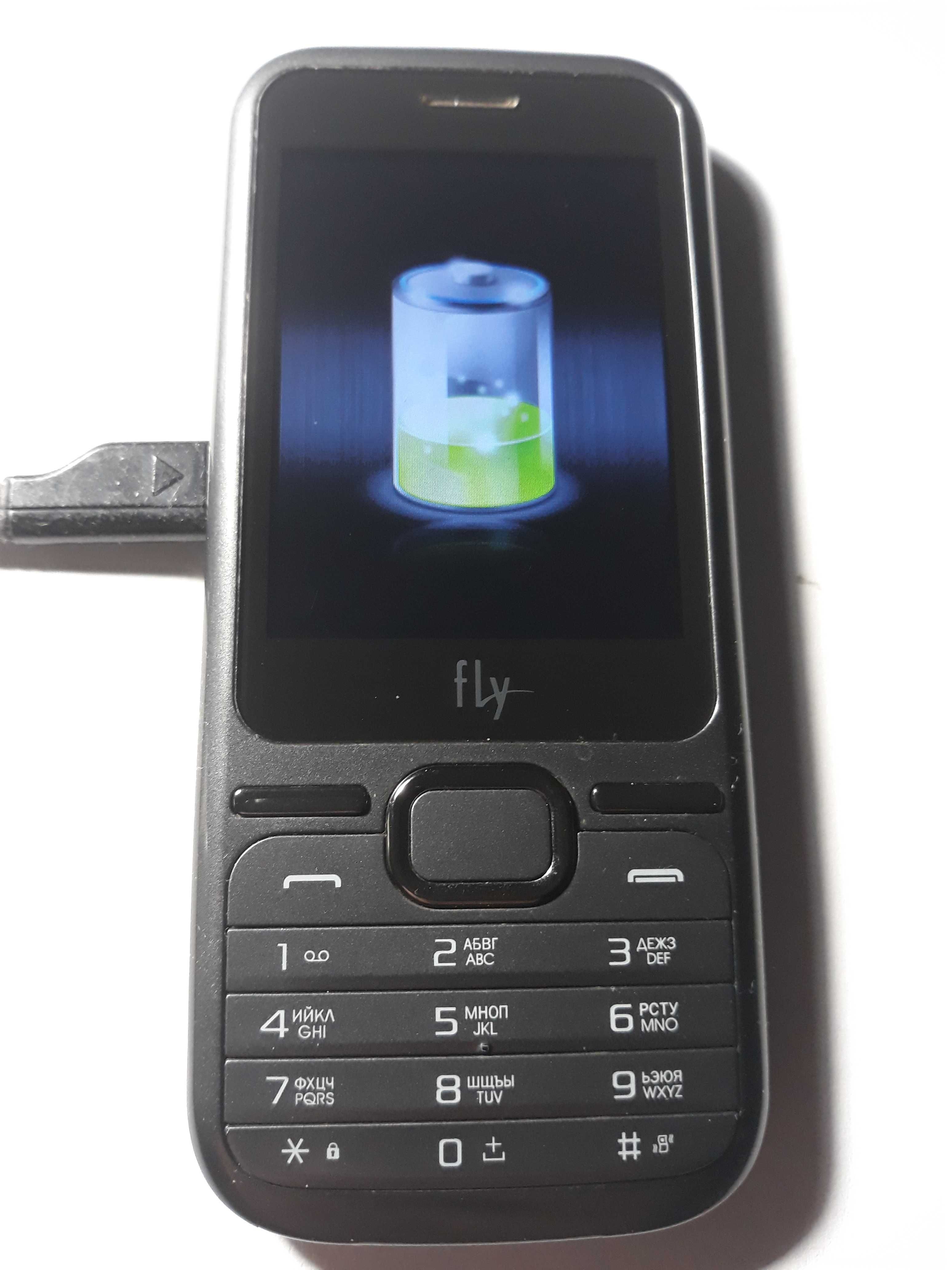 Телефон мобильный FLY-125 DS Dark Grey+ чехол из кожи