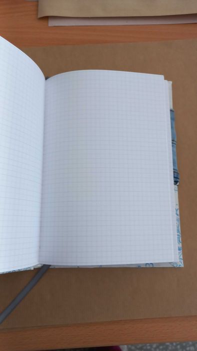 Zeszyty oprawione w jeans i flanelę