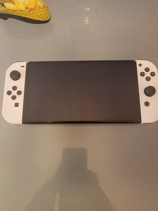 Nintendo Switch OLED 128GB, 7 pudełkowych gier, dodatkowy pad, etui