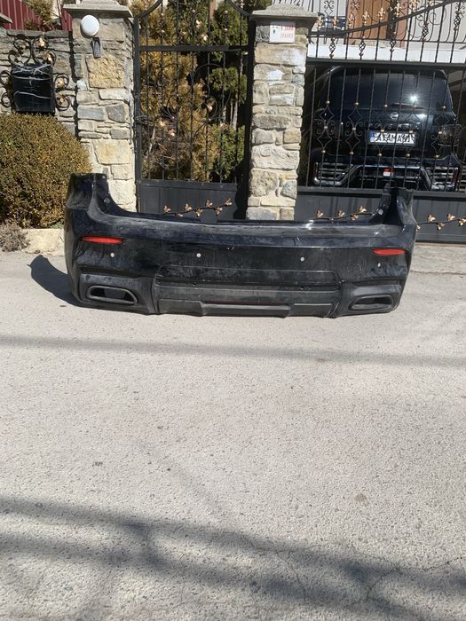 Дизайнерський задній бампер на Інфініті qx 56-80 2010-