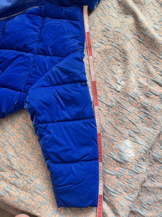 Подовжена зимова стьобана куртка пуховик