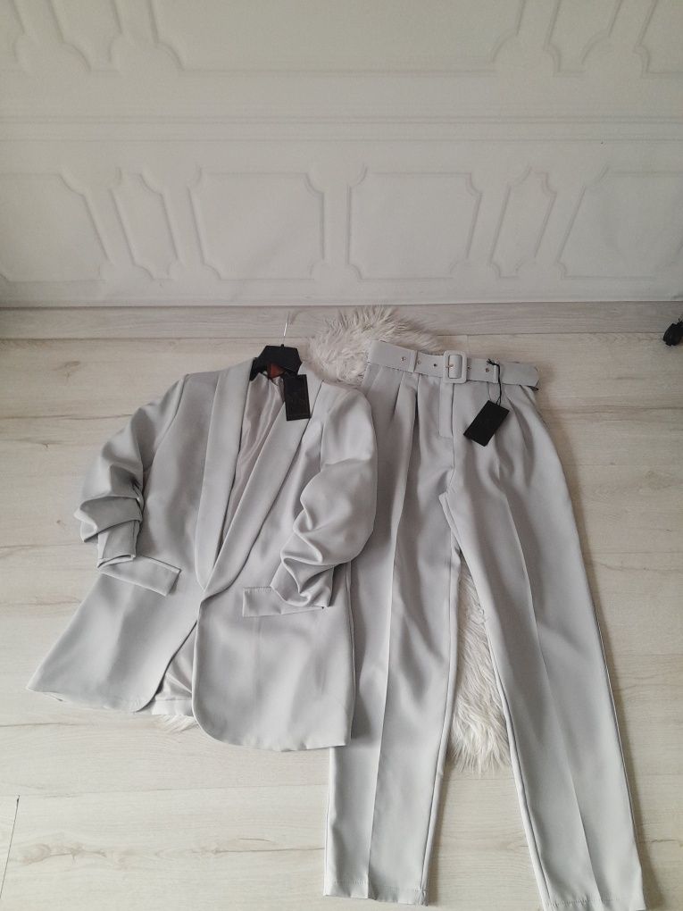 Szary elegancki garnitur marynarka + spodnie w kant M