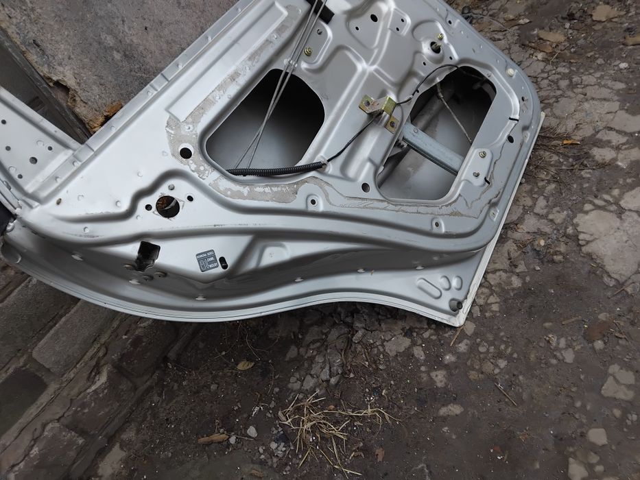 Левая пассажирская дверь серебро ланос сенс деу Daewoo Lanos U92