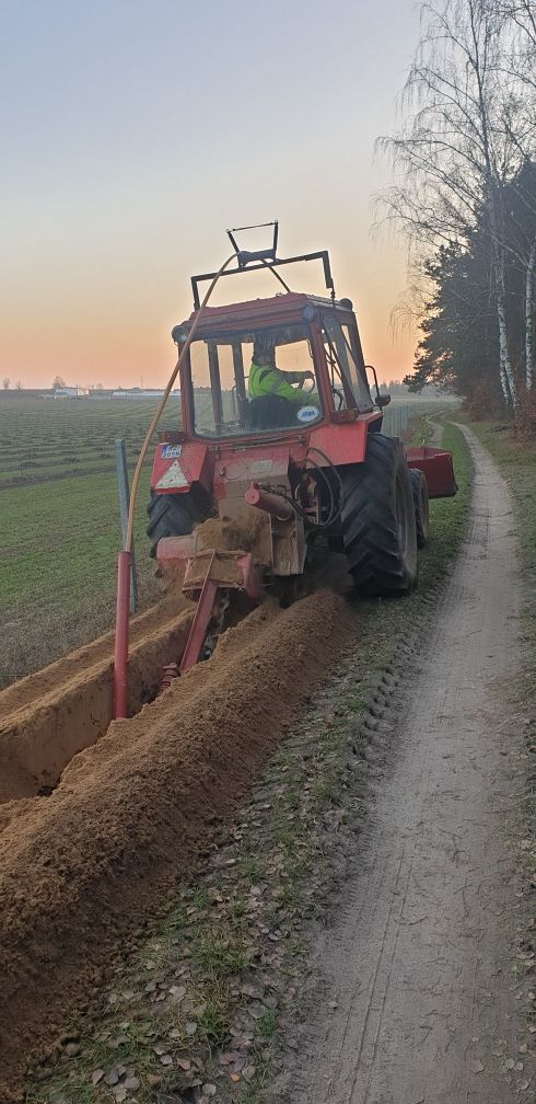 Usługi koparką łańcuchową wykopy liniowe, gaz prąd woda drenaż