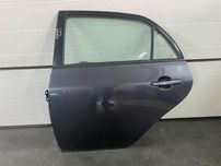 Двері дверка дверь двери задні ліві Toyota Corolla E150 2006-2012р.
