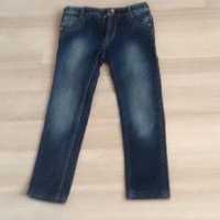 Продаются джинсы темно-синего цвета с утяжками для девочки
