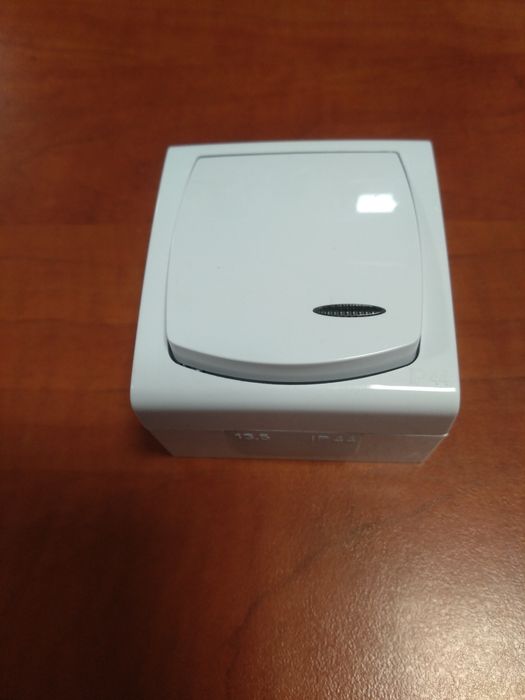 Łącznik jednobiegunowy podświetlany IP 44 OSPEL