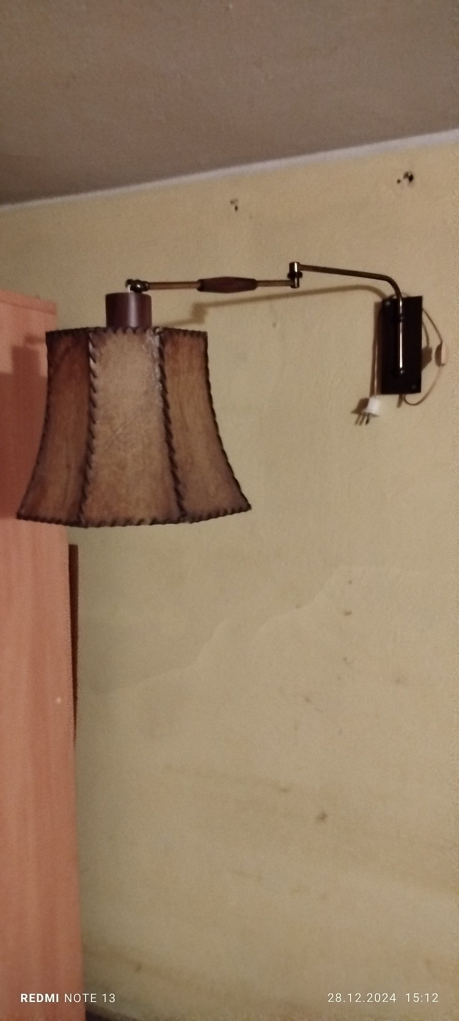 Stylowa lampa regulowana , ścienna.
