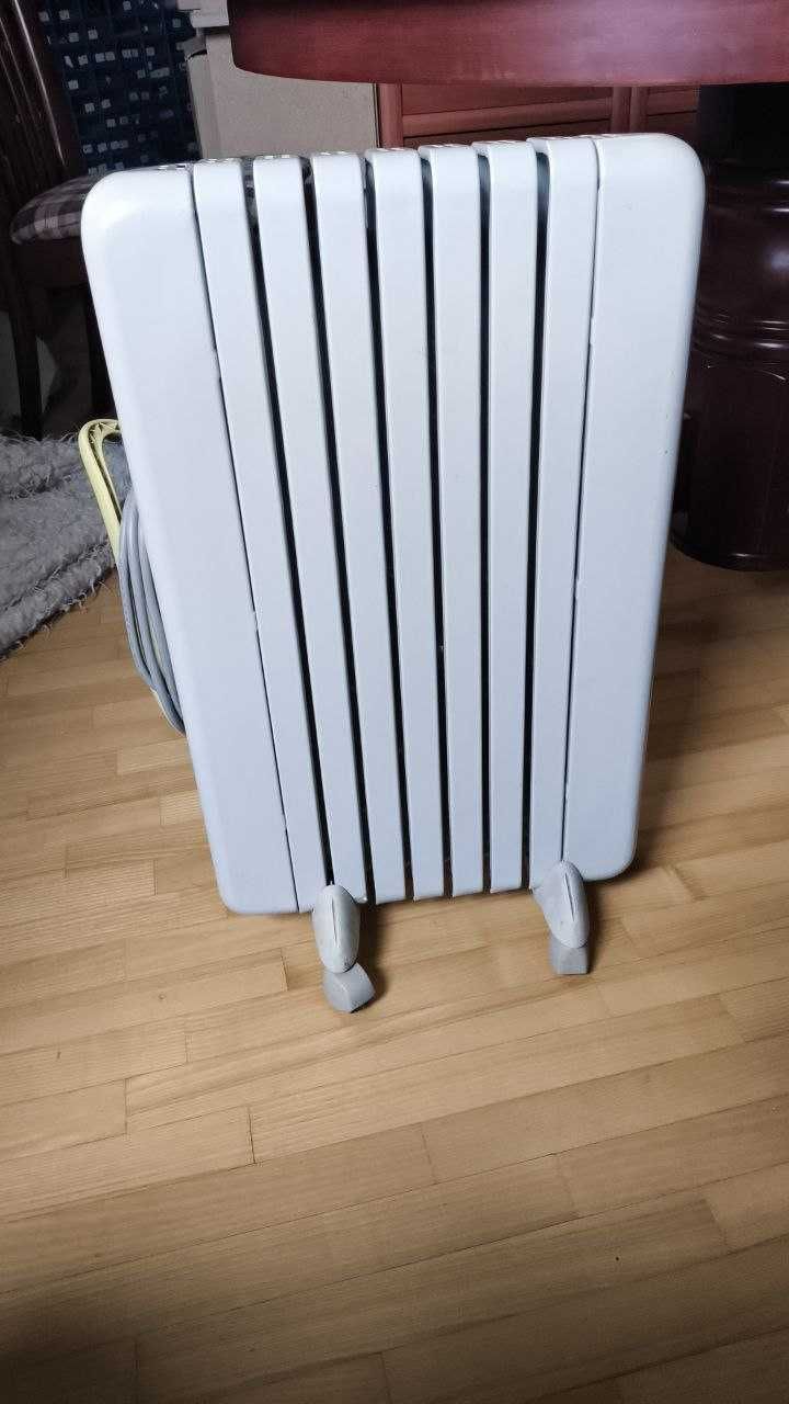 Обогреватель масляный Delonghi TRSW 0715 1500 Вт на 7 секций