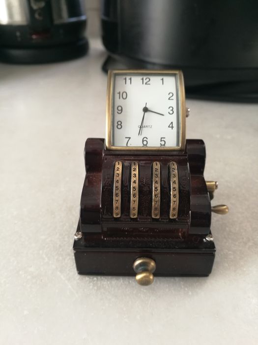 Relógio caixa registadora