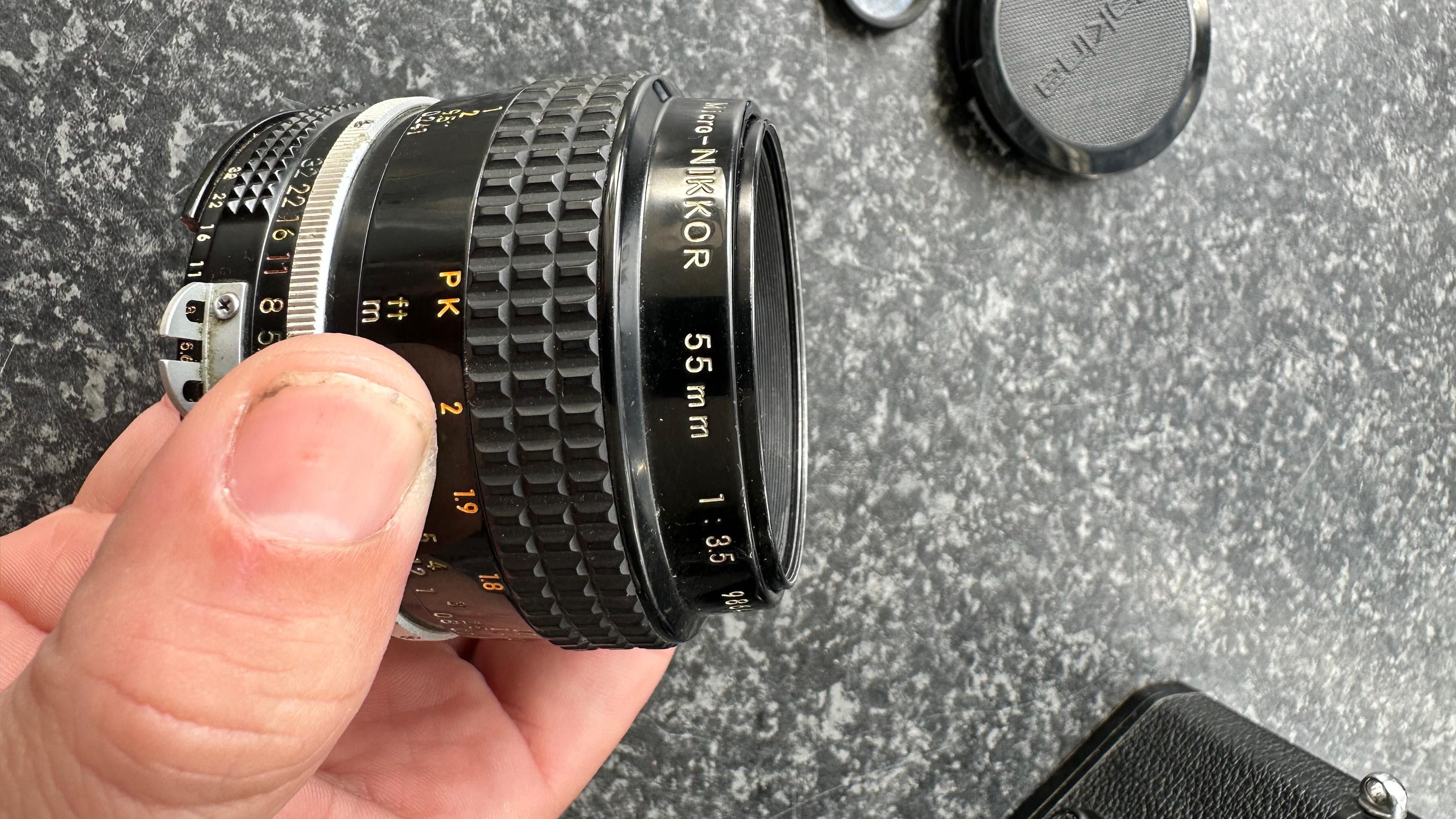 Urgente NIKON FM2 lente 55Micro
