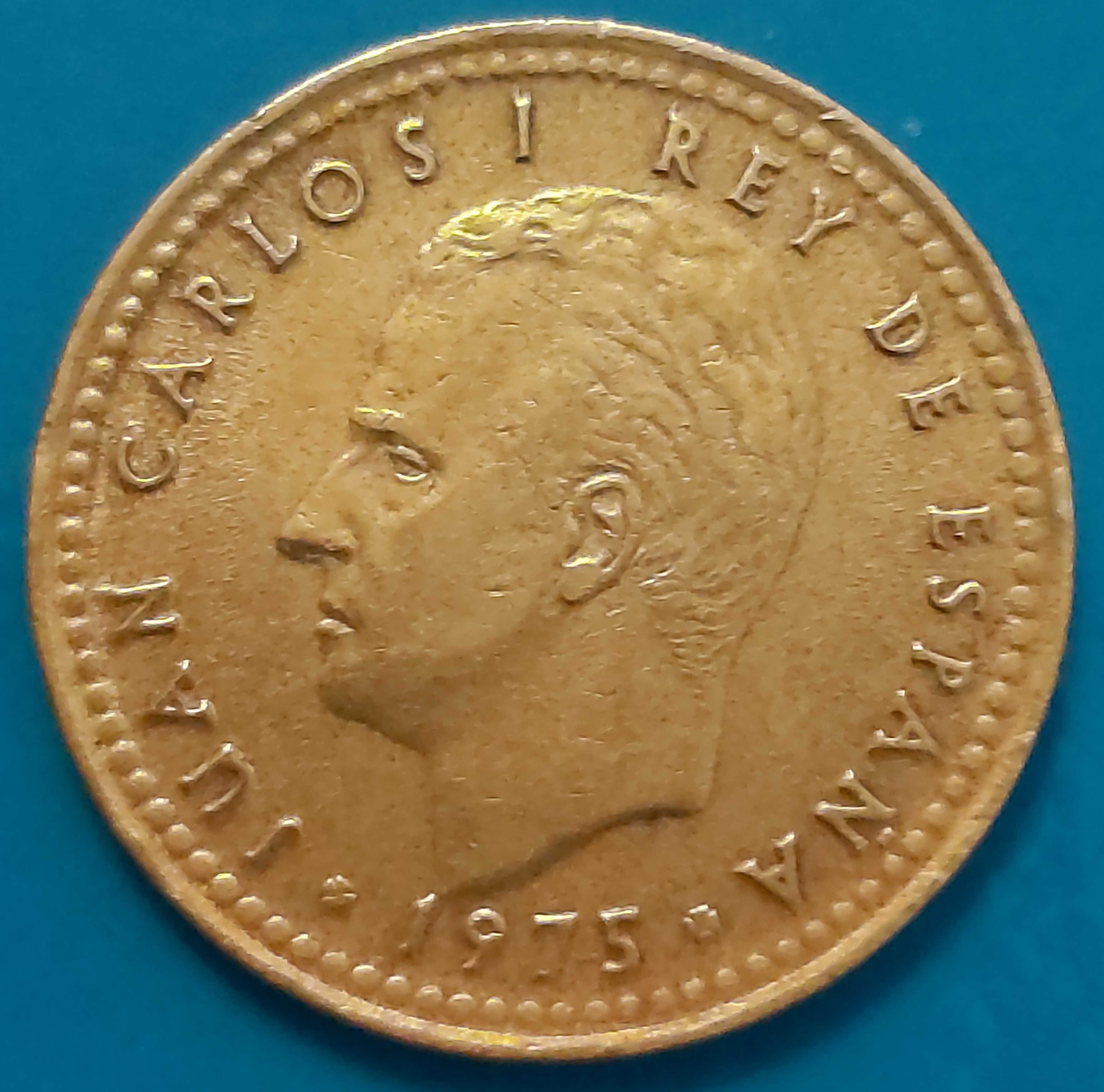 Una Peseta de 1975 com *77* na estrela