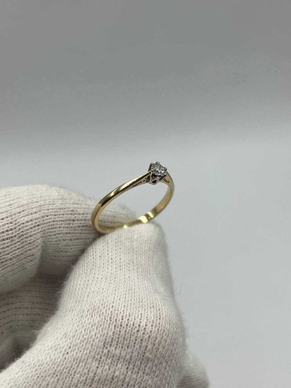 Złoty pierścionek z brylantem 14K 1.50g