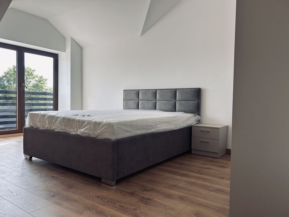Łóżka tapicerowane na wymiar – solidne, eleganckie, nowoczesne