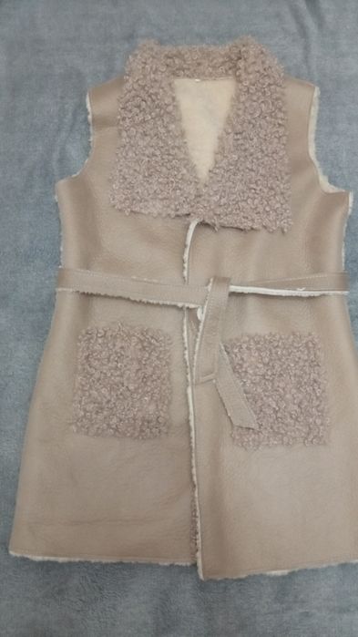 Безрукавка на овчині