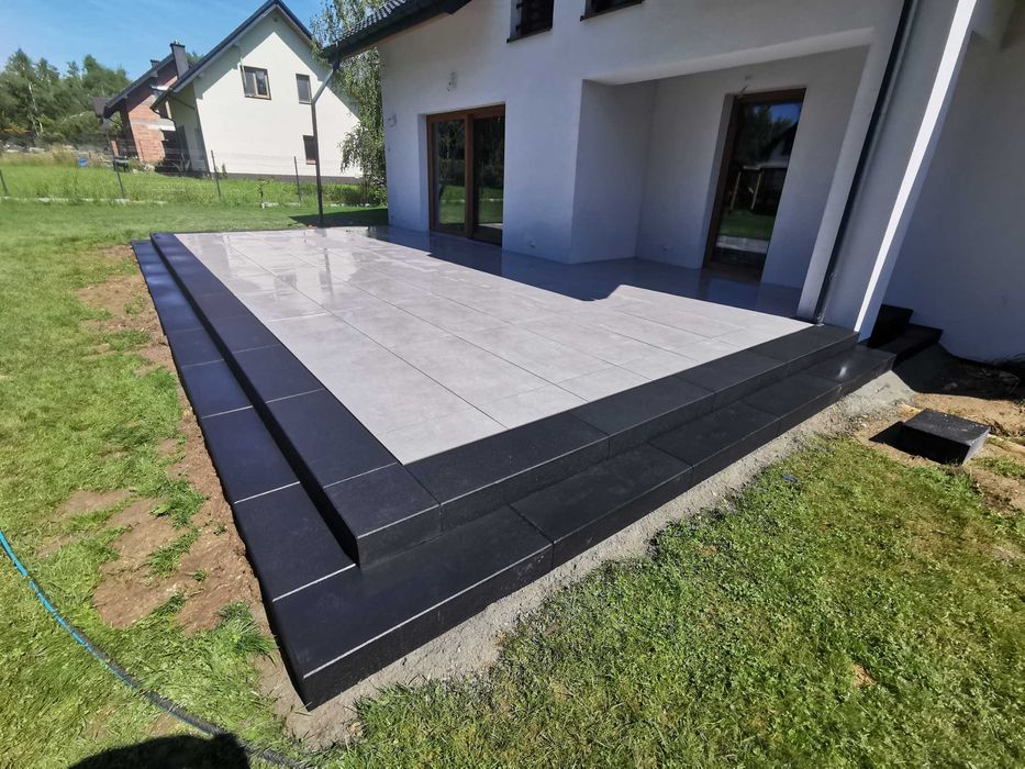 Brukarstwo Układanie kostki brukowej.