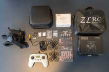 Conjunto FPV - 2 Drones, Comando, Goggles e acessórios