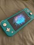 Nintendo Switch Lite + mala & jogos!