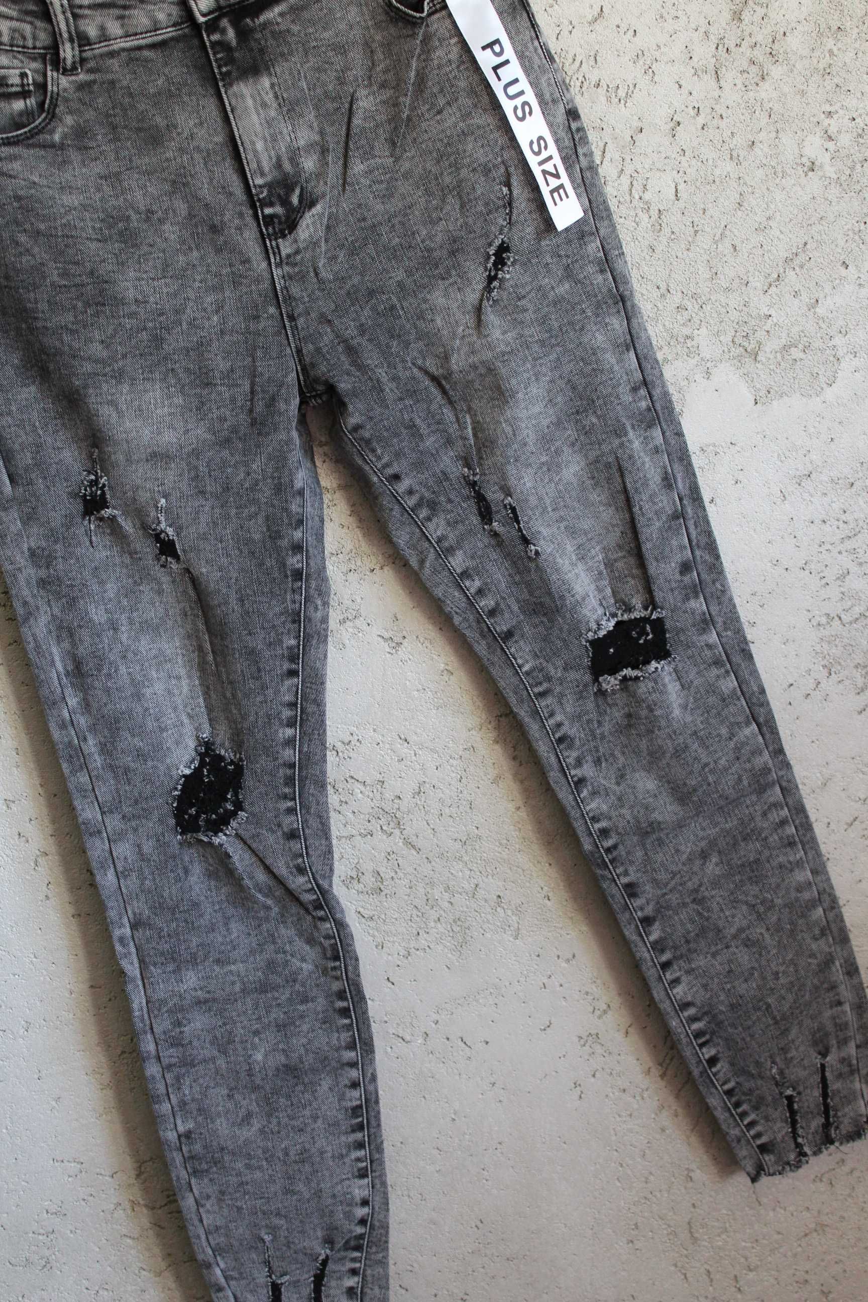 Świetne ciemne jeansy z dziurami PUSH UP pupa r.48 DAYSIE