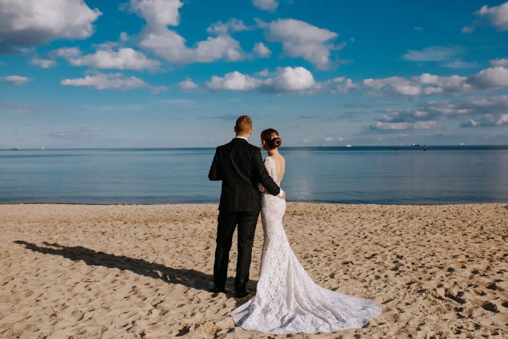 Koronkowa suknia ślubna rybka / syrenka, długi tren, długi rękaw 34-36