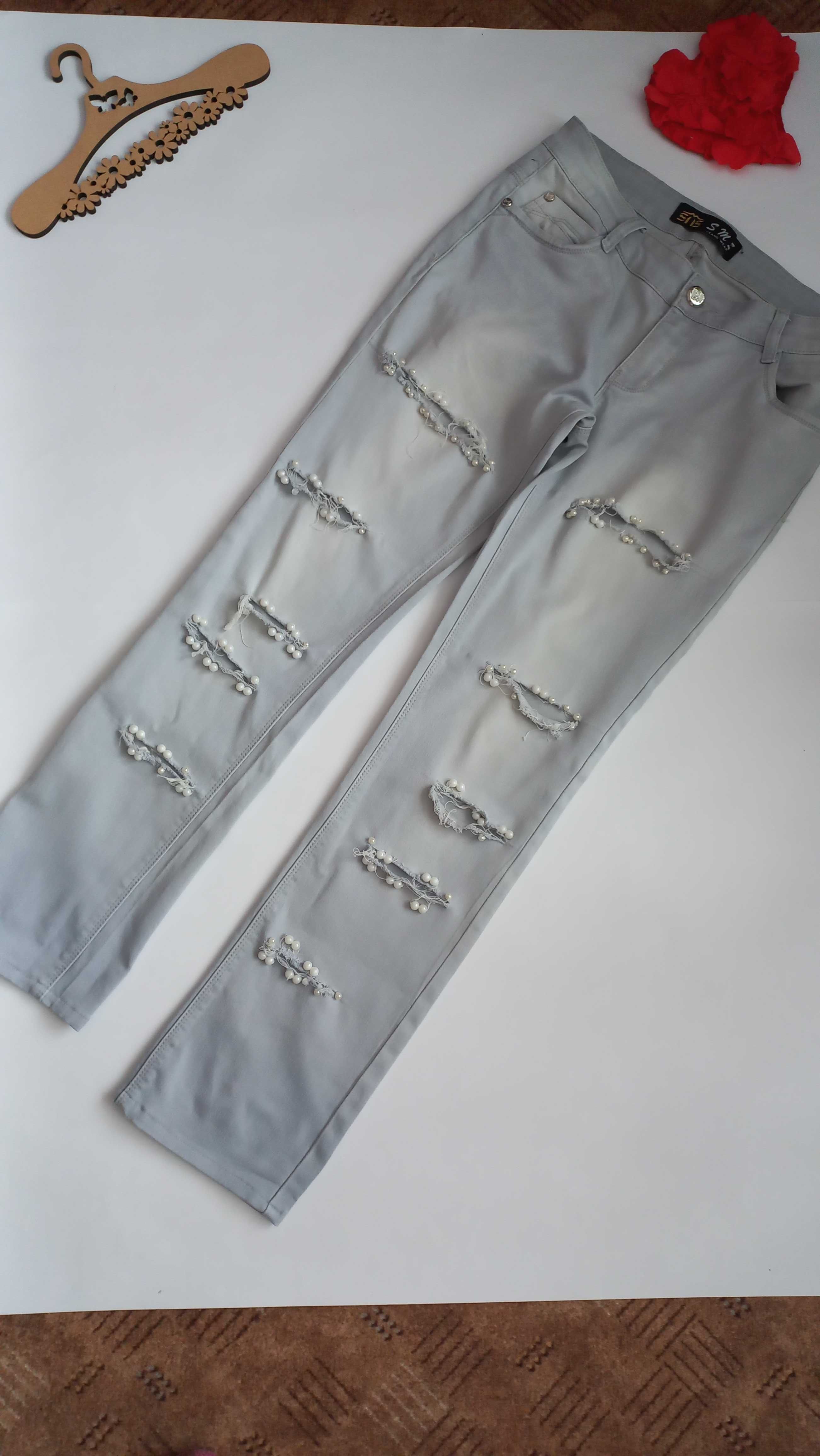 Голубые рваные джинсы 48 50 размер на лето