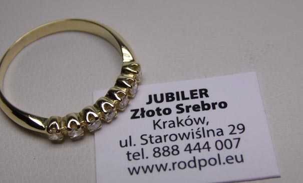 Złoty pierścionek z diamentami 0,25 ct. R.14