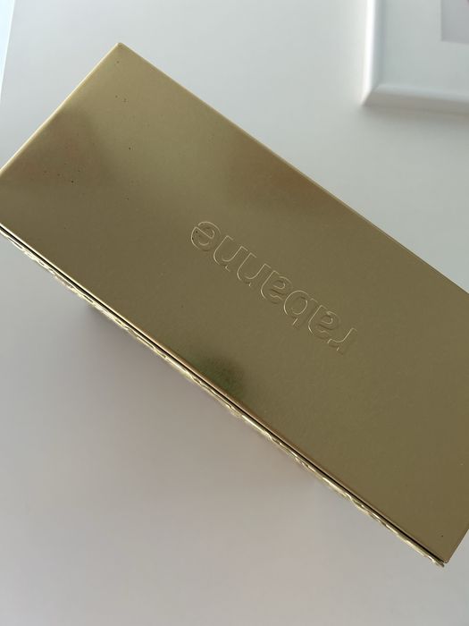 Caixa paco rabanne dourada