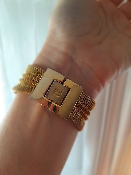 Relogio dourado cristian lay