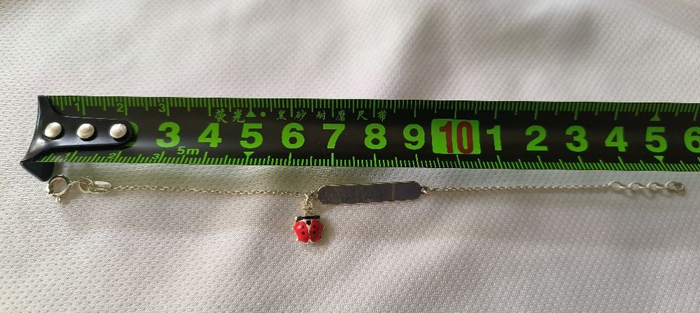 Pulseira criança em prata com chapa e joaninha