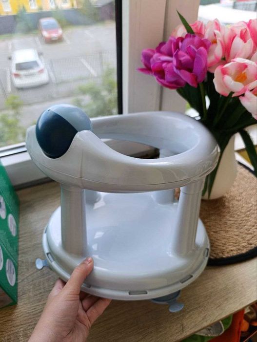 Поворотне дитяче сидіння в ванну