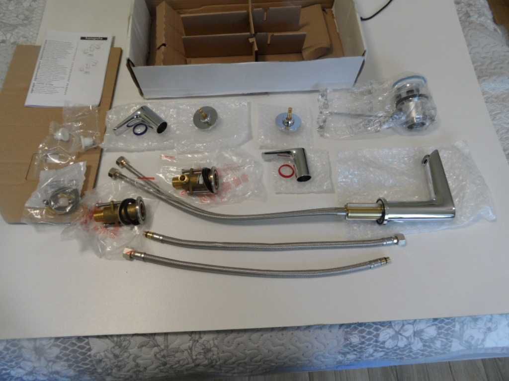 Hansgrohe Talis E - bateria umywalkowa z wylewką, chrom.