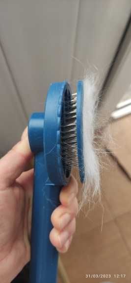 Escova auto-limpeza para animais de estimação