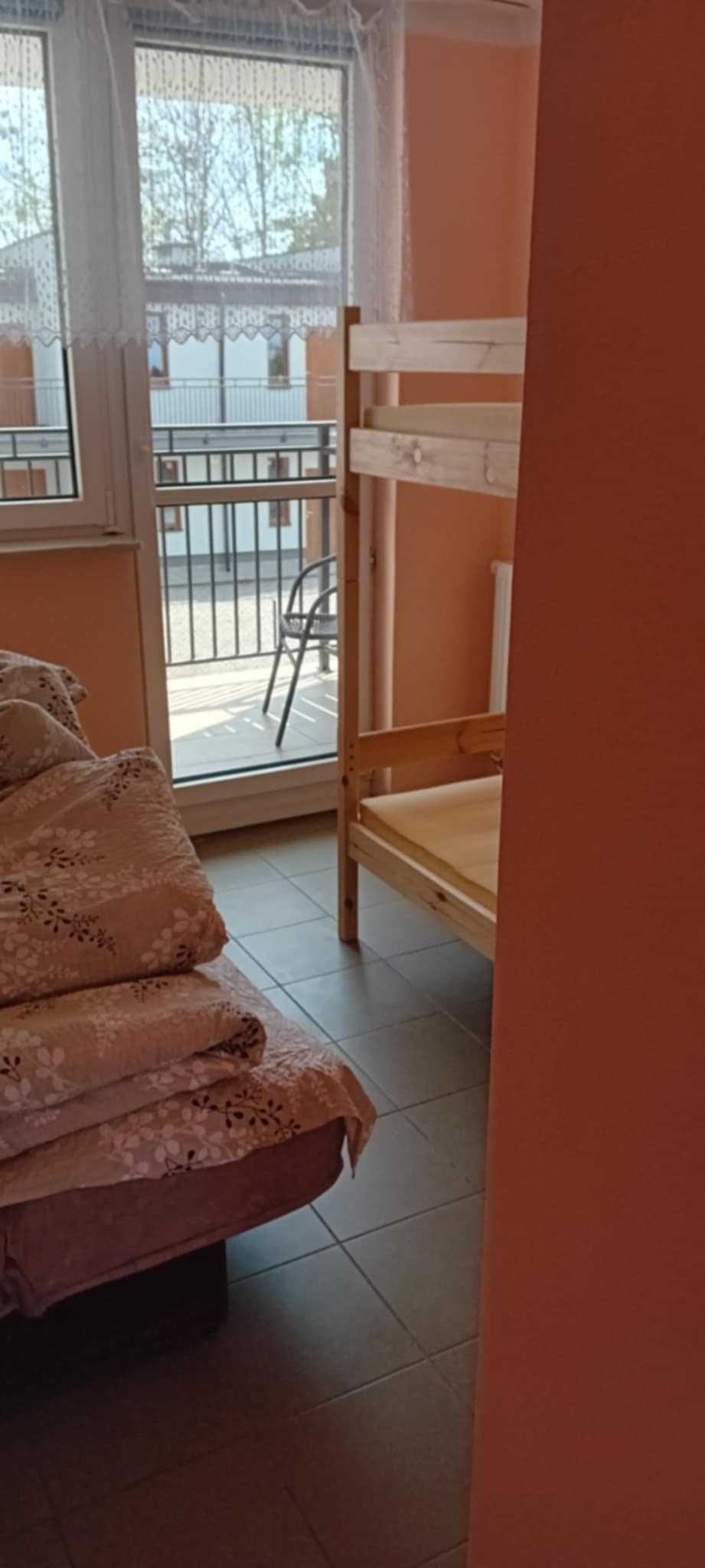 Pod Palmami ,domki i pokoje w centrum
