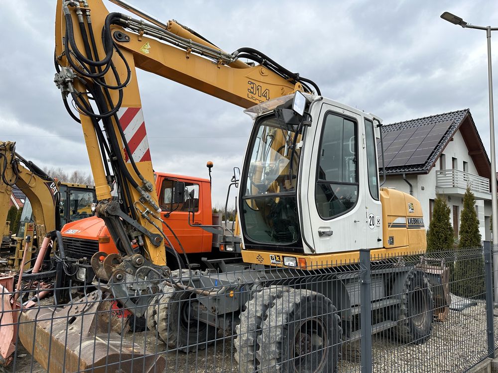 Wynajem koparki obrotowej kołowej Liebherr usług koparką