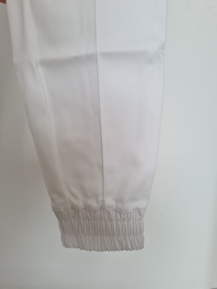 Spodnie białe bawełniane M