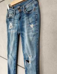 Spodnie jeansowe dżinsowe jeansy True Religion dziury