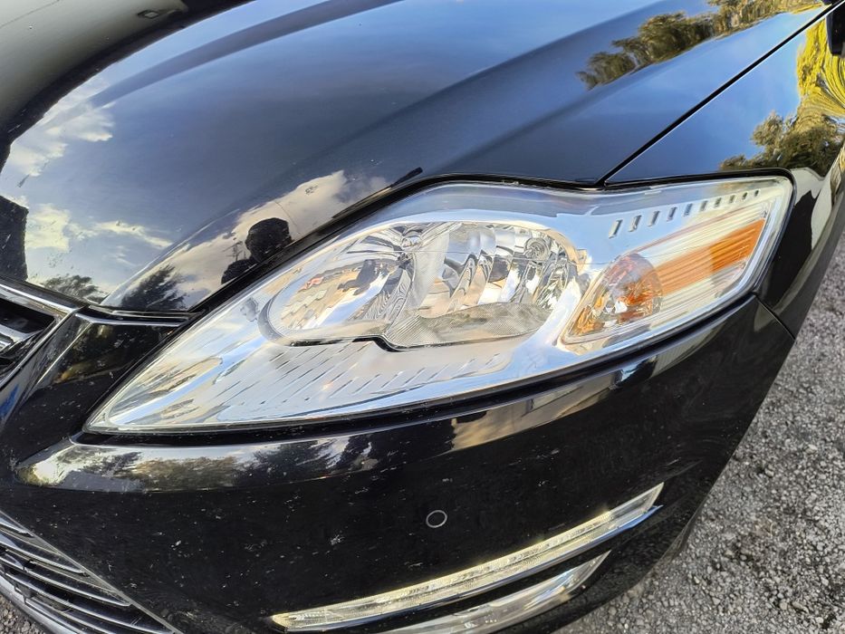 Ford Mondeo MK4 lift 10-14 - Reflektor lewy kpl. Oryginał EUR.