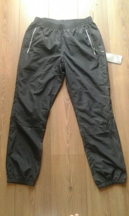 WYPRZEDAŻ Nowe spodnie dresowe firmy 4f męskie rozmiar M