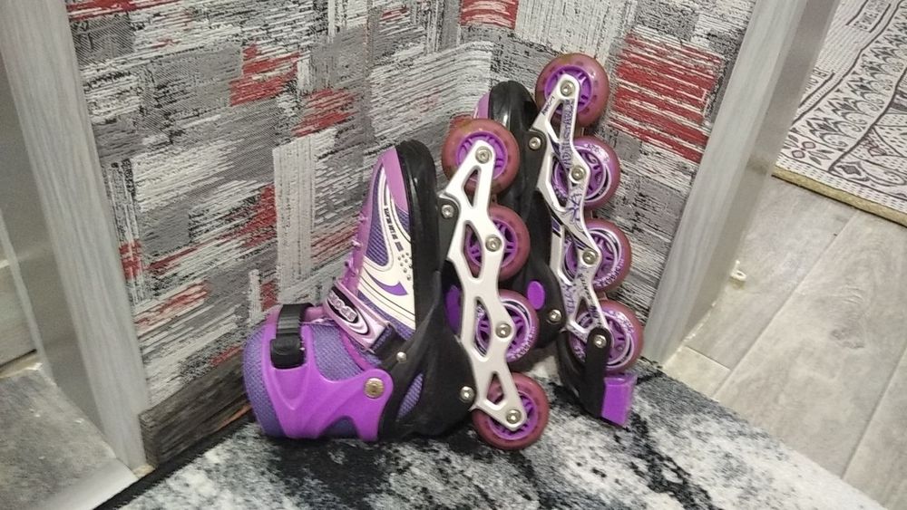 Ролики фіолетові б/у.