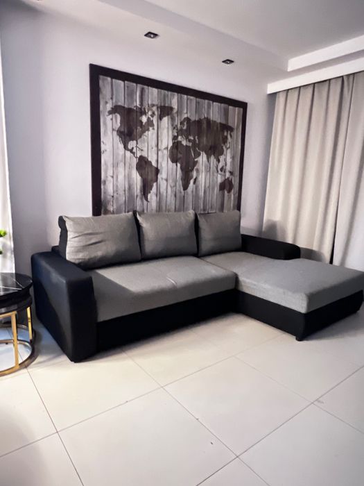 Narożnik szary sofa funkcja spania Kanapa lozko