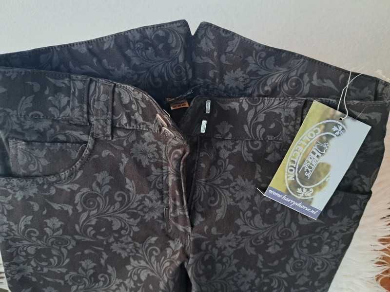 Bryczesy kwiatowy print nowe r.40