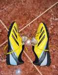 Chuteiras Adidas Amarelas e Pretas
