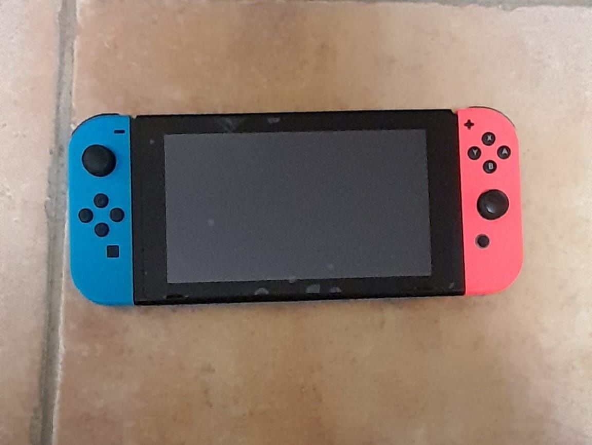 Nitendo Switch V1 + suporte comandos capa original 1 comando 3 jogos