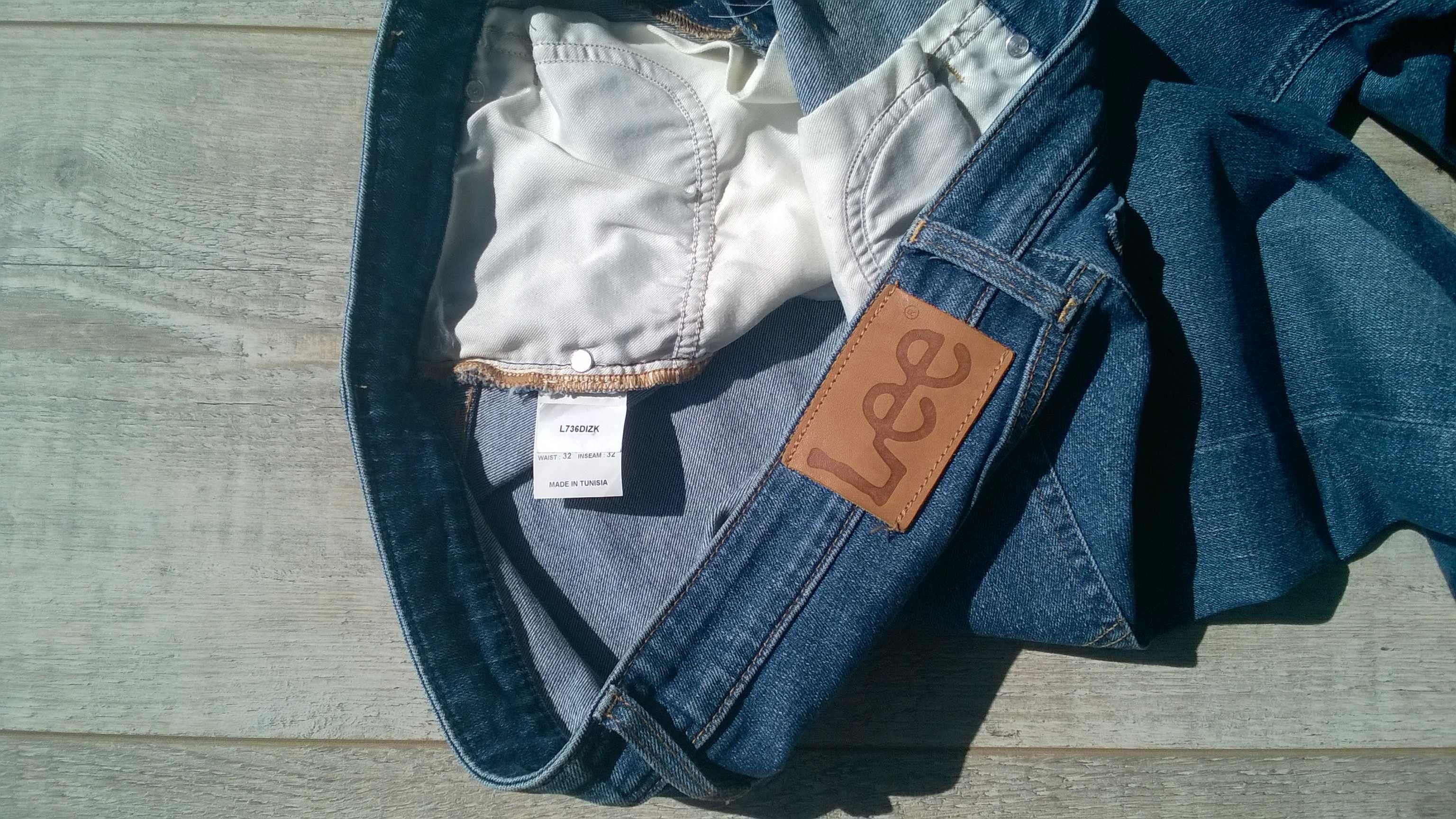 Spodnie jeans Lee  rurki 32/32 niebieskie