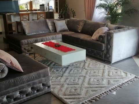 Duży narożnik w stylu glamur  + duża pufa