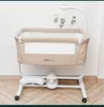 Приставне ліжечко з режимом заколисування Mioobaby Hugmee