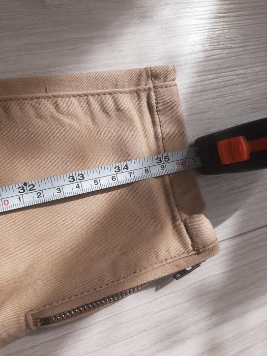 Beżowe spodnie Orsay XS