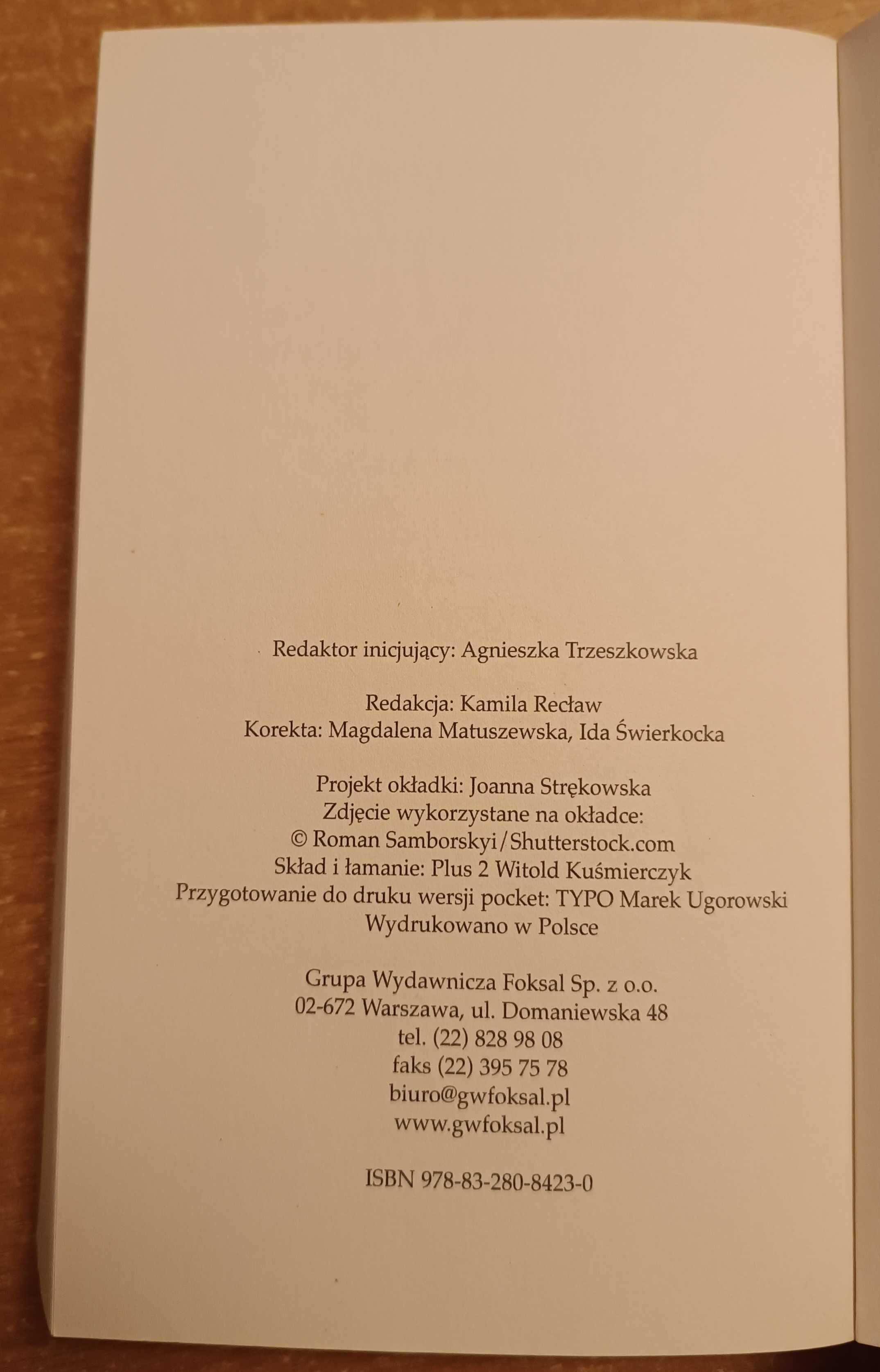 Książka "Osaczona" Pola Roxa (uszkodzona)